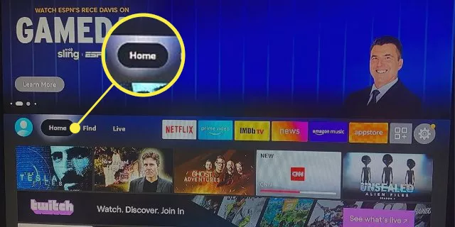 From the Firestick home screen, locate the top menu bar.