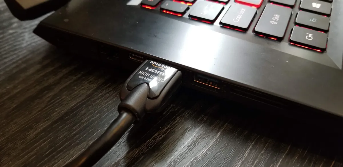 Connect the HDMI cable to the HDMI port on your laptop